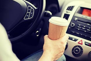 Holding Hot Coffee While Driving