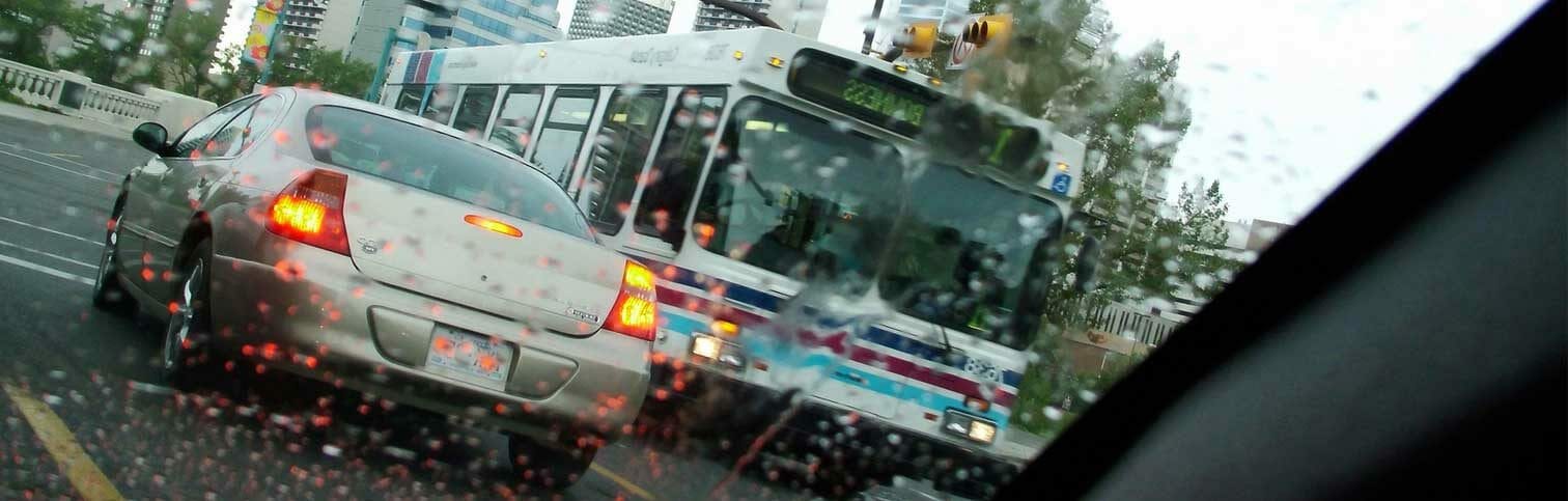 Car and a Bus Passing Each Other